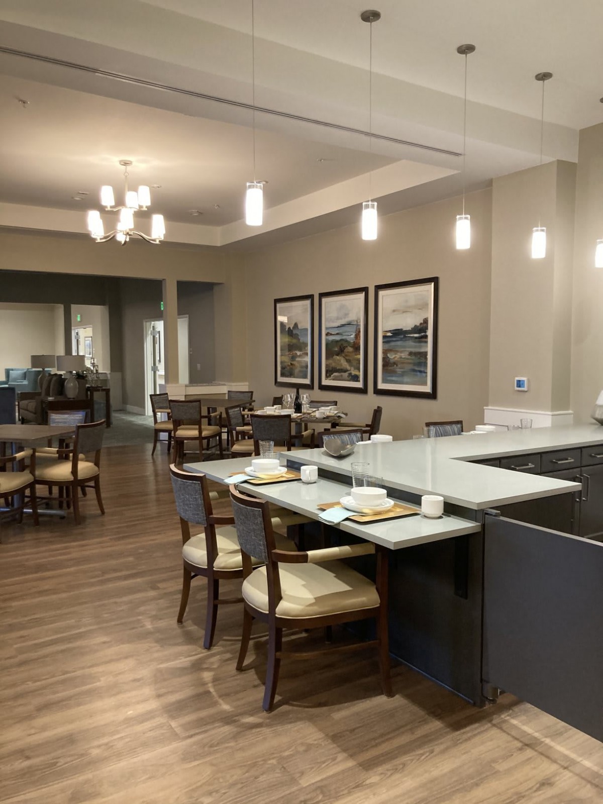 A modern dining area with stylish seating and ambient lighting.