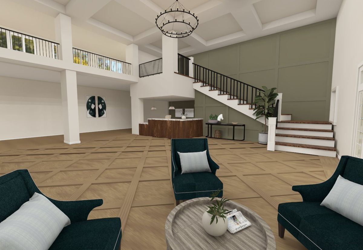 A modern lobby featuring a seating area with stylish furniture, a grand staircase, and an elegant chandelier.