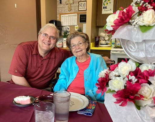 A heartwarming moment shared between family members during a meal.