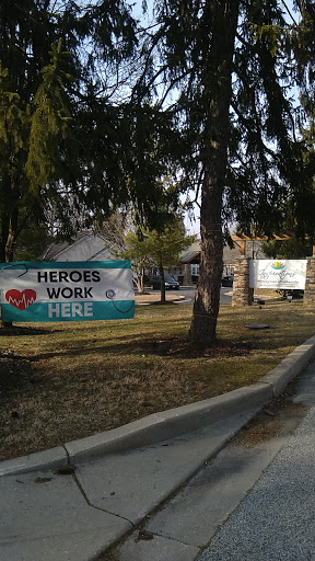 Banners displaying appreciation for local heroes in a community setting.