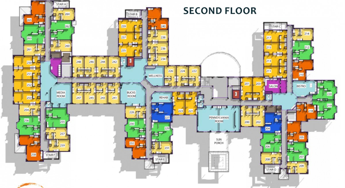 A detailed floor plan of the second level, showing room layouts and corridors.