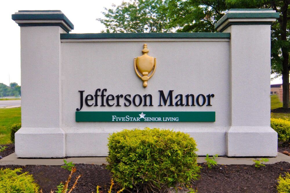 Entrance sign for Jefferson Manor, a senior living facility.