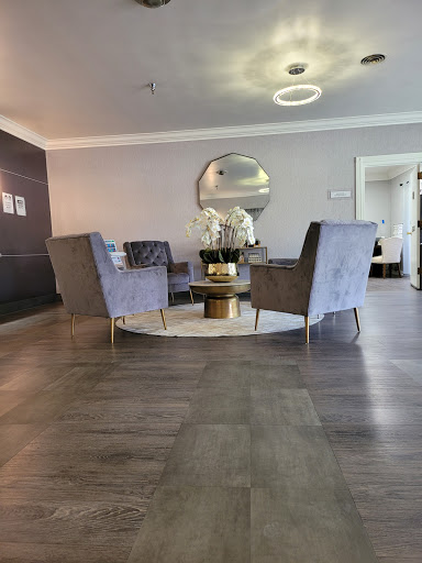 A stylish and modern lobby area featuring comfortable seating and elegant decor.