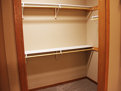 A spacious empty closet ready for organization.