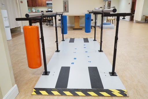 An obstacle course designed for balance training, featuring colored cylindrical elements.