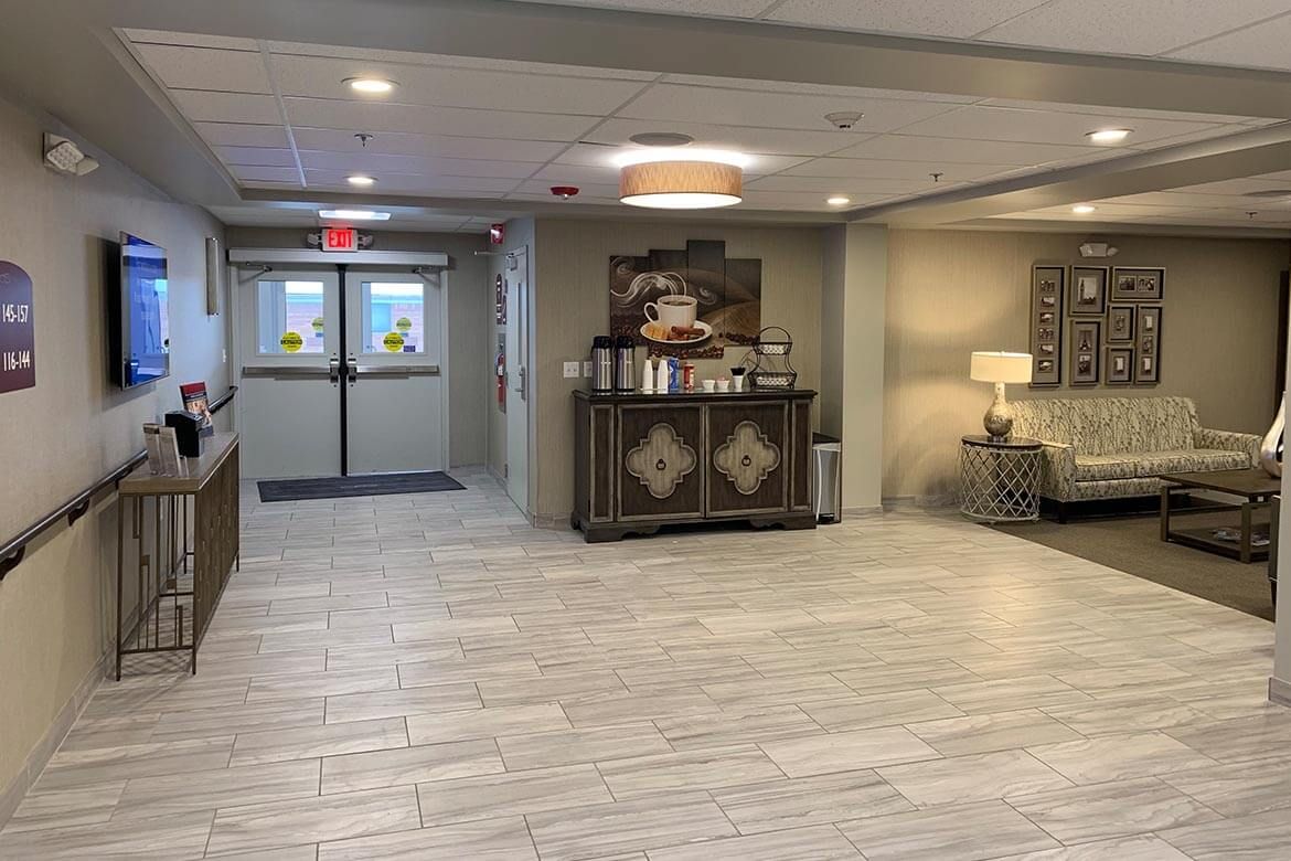A modern lobby with elegant decor and comfortable seating.