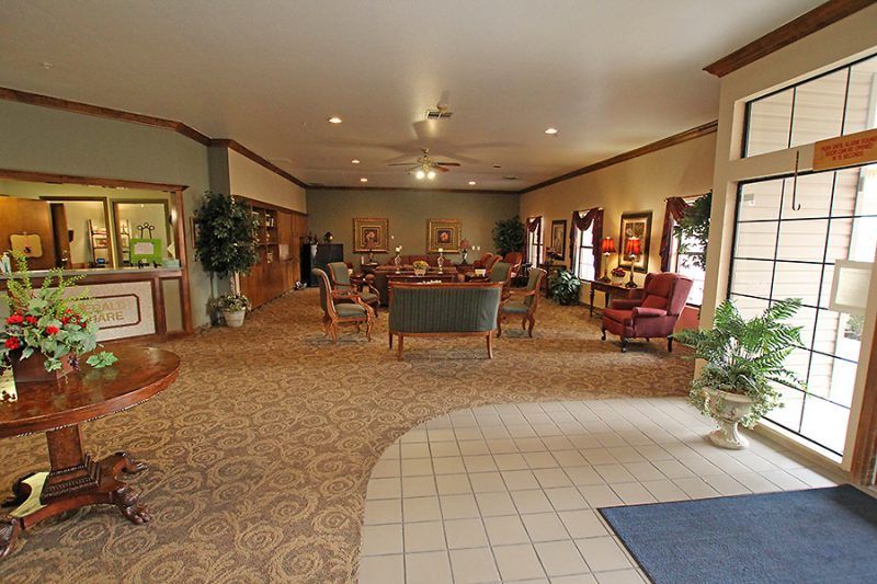 A spacious lobby area with comfortable seating and elegant decor.