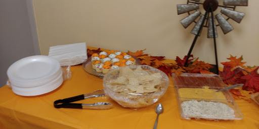 A festive table display featuring a variety of desserts, perfect for a Thanksgiving gathering.