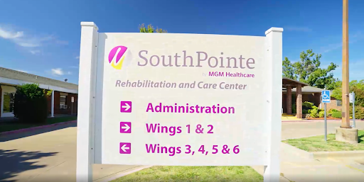 Sign directing to various sections of SouthPointe Rehabilitation and Care Center.