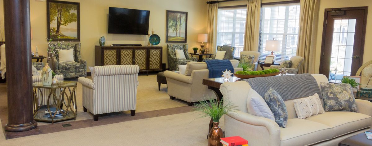 A cozy living room with comfortable seating and modern decor.