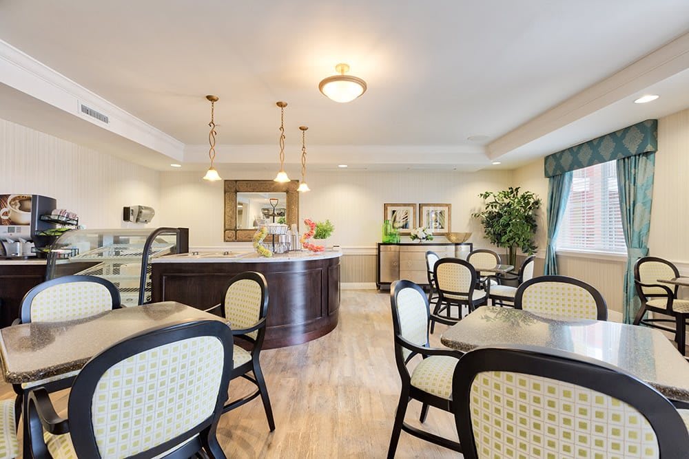 A cozy dining area with modern decor and comfortable seating.