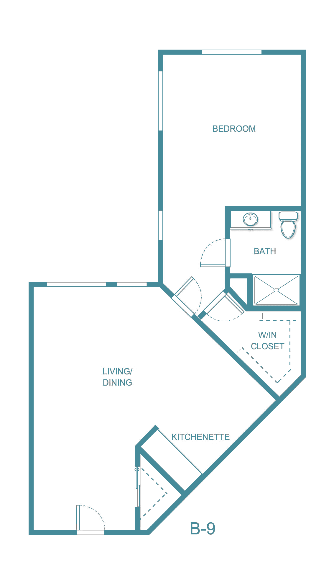 This is a floor plan of an apartment featuring a bedroom, bathroom, living/dining area, and kitchenette.