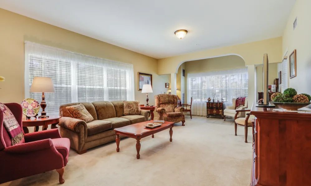 A cozy living room with comfortable seating and natural light.