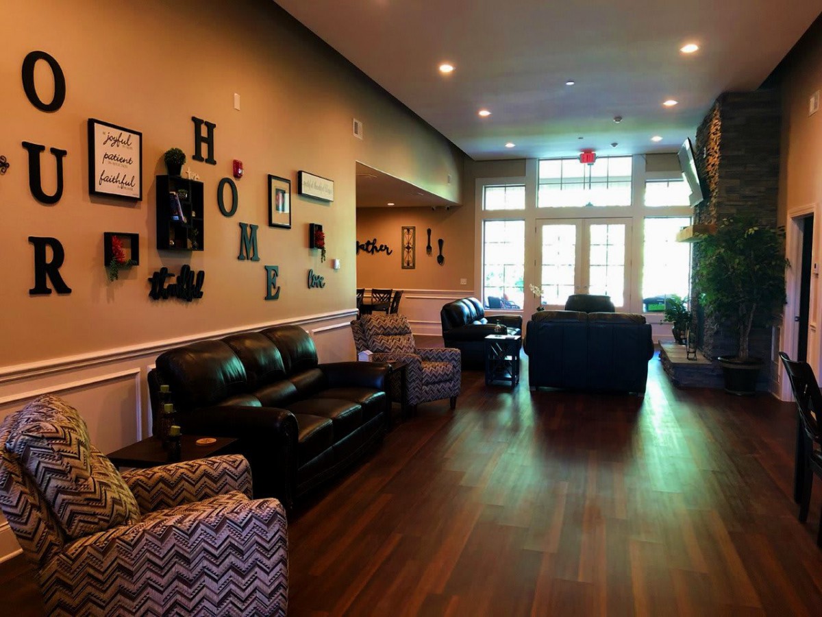 A cozy living room with comfortable seating and warm decor.