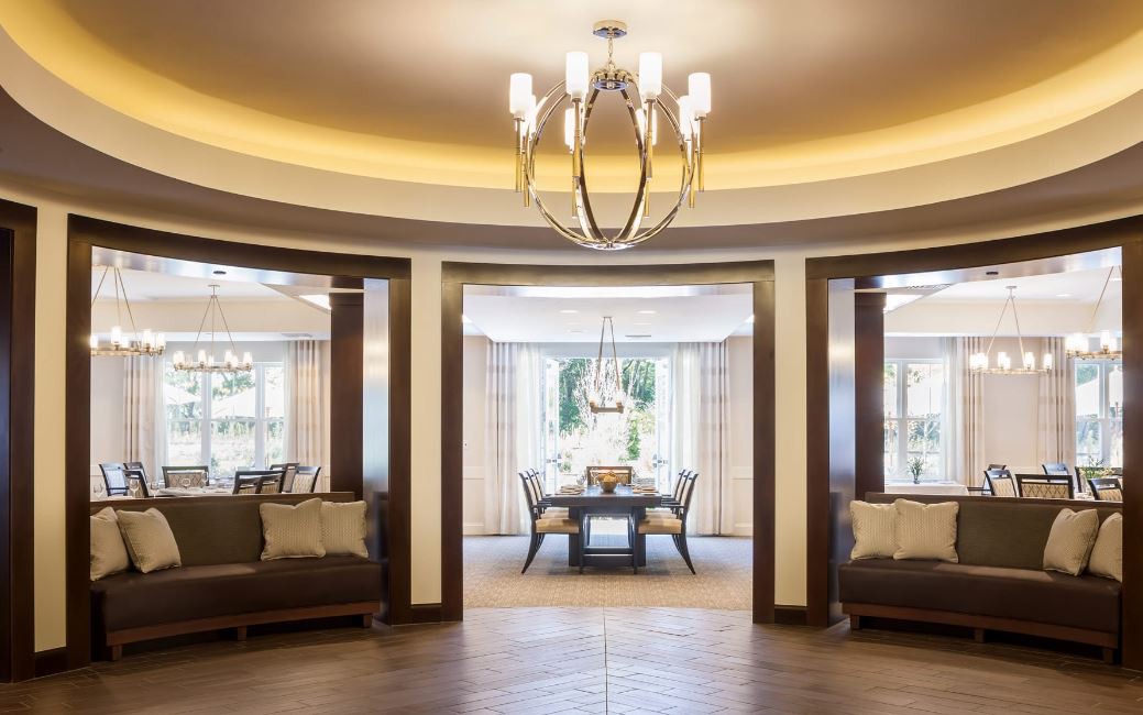 A luxurious lobby with elegant chandeliers and plush seating areas.