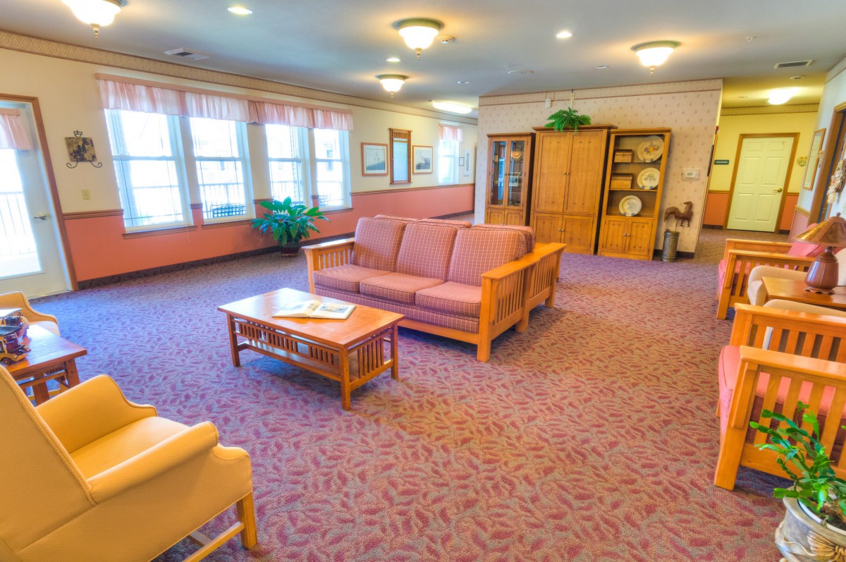A bright and cozy living room with comfortable seating and natural light.