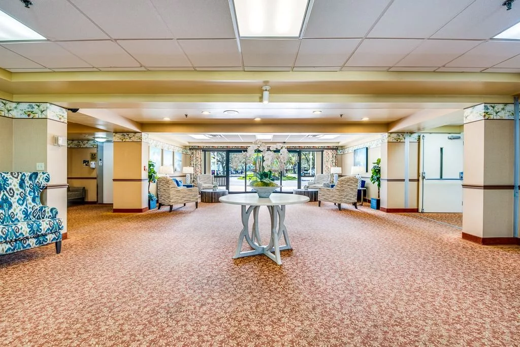 A spacious and modern lobby with comfortable seating and elegant decor.
