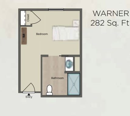 A compact studio apartment floor plan with a bedroom and bathroom layout.