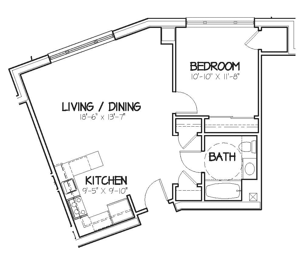 A floor plan of a one-bedroom apartment showing the layout of the living/dining area, kitchen, bedroom, and bathroom.