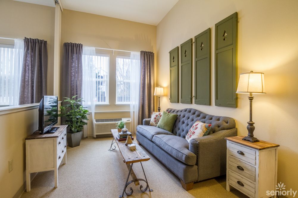 A cozy living room with comfortable seating and tasteful decor.