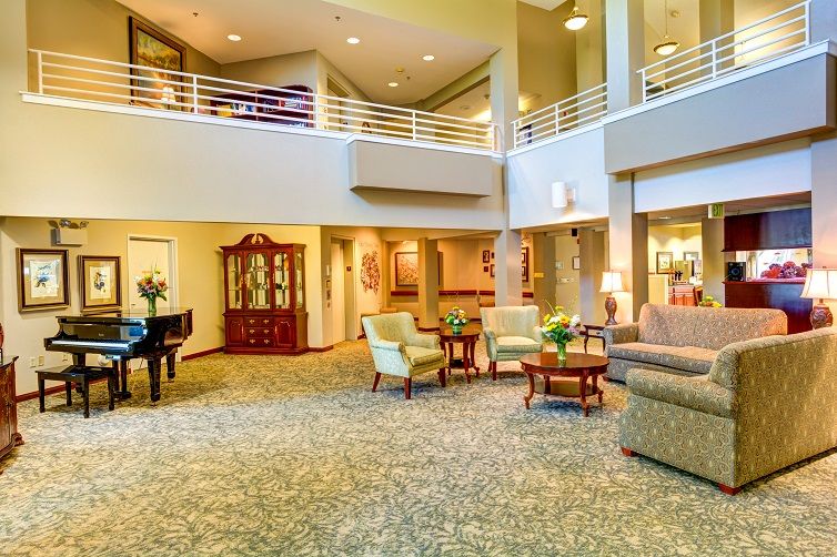 A spacious lobby with comfortable seating and elegant decor.