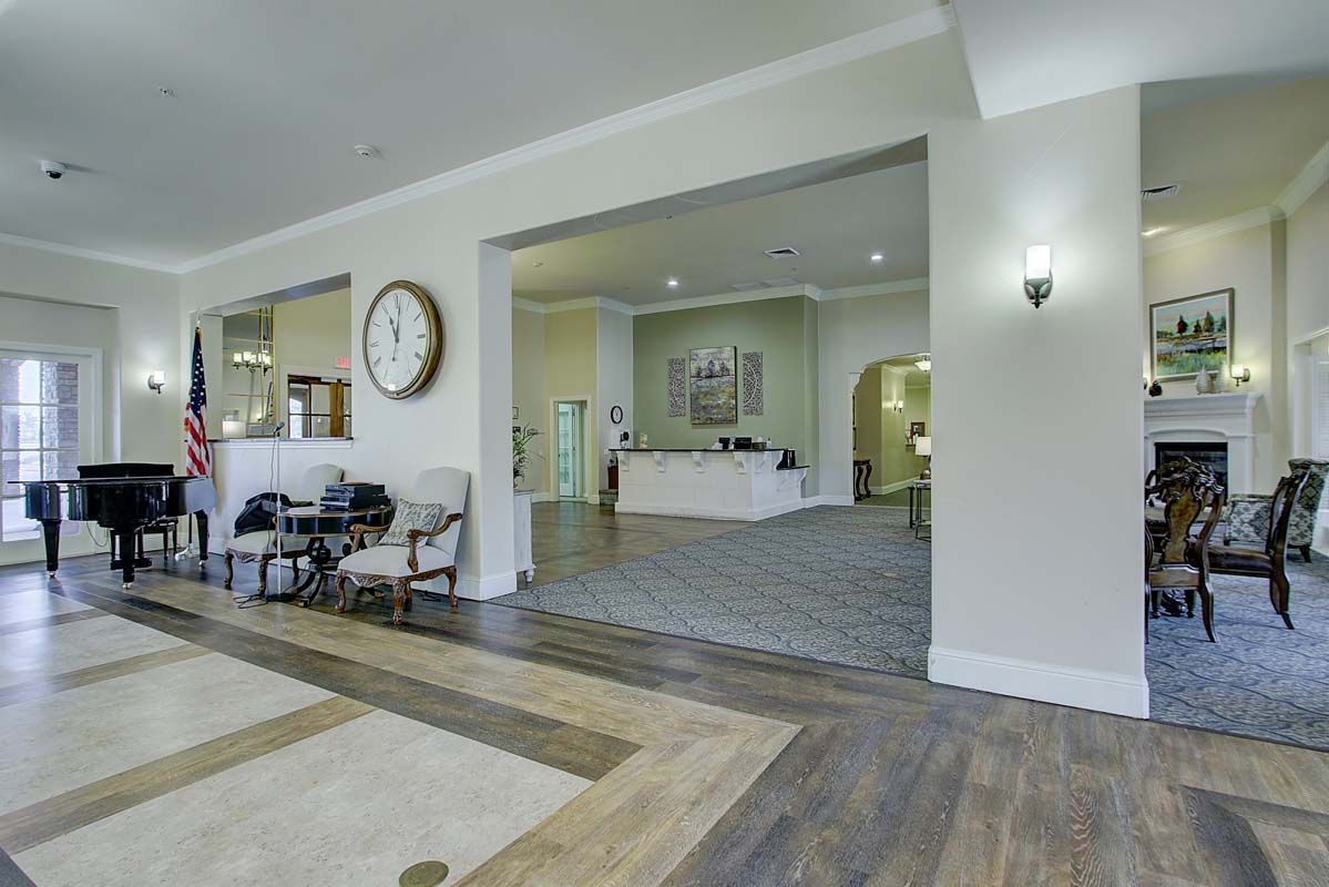 A spacious and well-lit reception area with a modern design.
