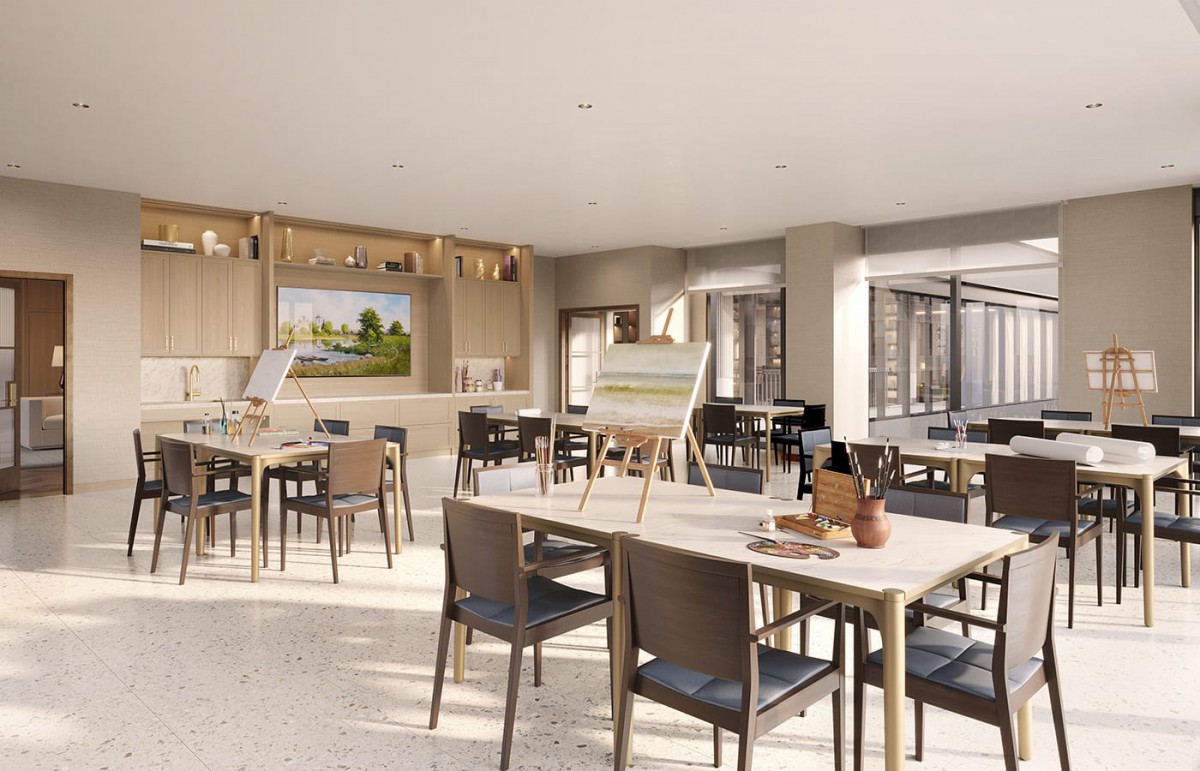 A modern dining area with ample natural light and elegantly arranged tables and chairs.
