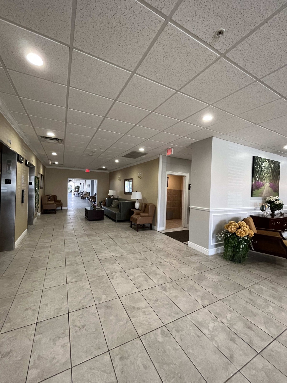 A spacious lobby with comfortable seating and a bright, welcoming atmosphere.