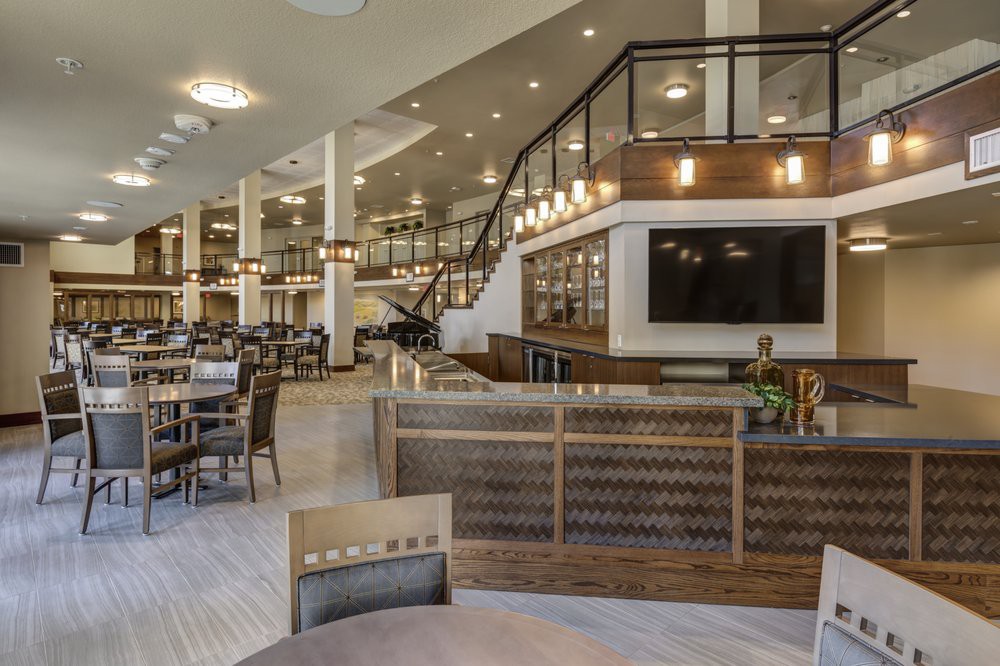 A modern restaurant interior featuring stylish seating and elegant decor.
