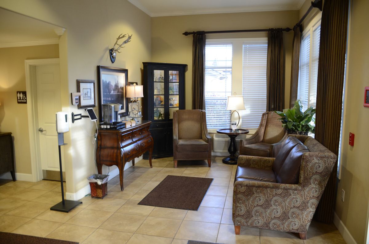 Cozy living room with comfortable seating and elegant decor.