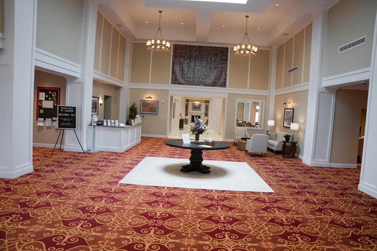Elegant hotel lobby with high ceilings and stylish decor.