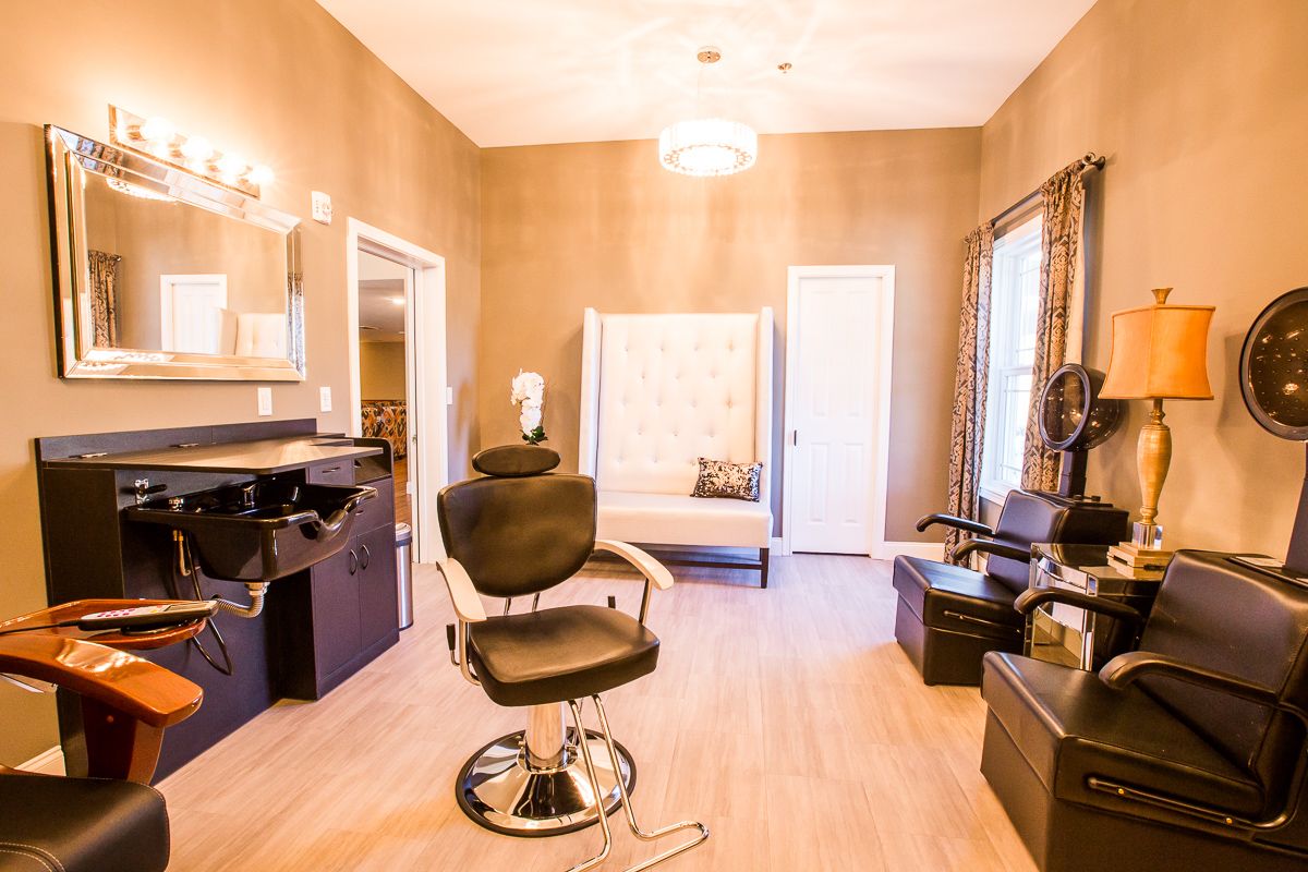 A chic and modern hair salon interior with stylish furniture.