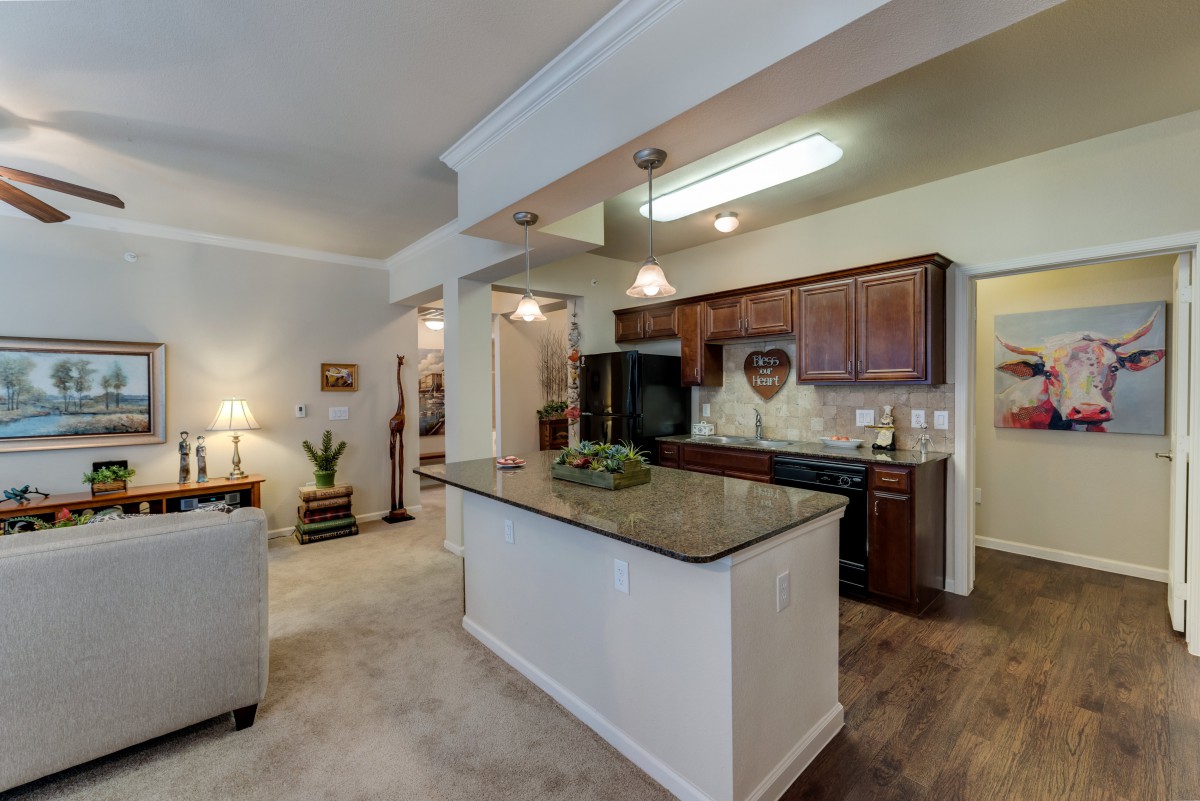 Modern kitchen with an open layout and central island.
