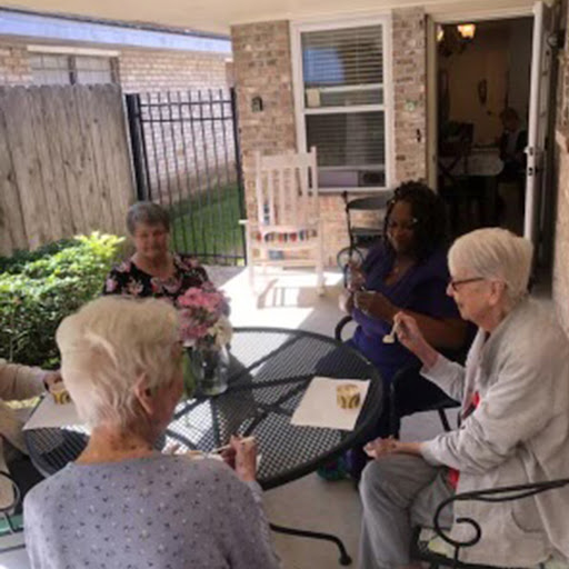 A cheerful gathering of seniors enjoying a sunny afternoon together.