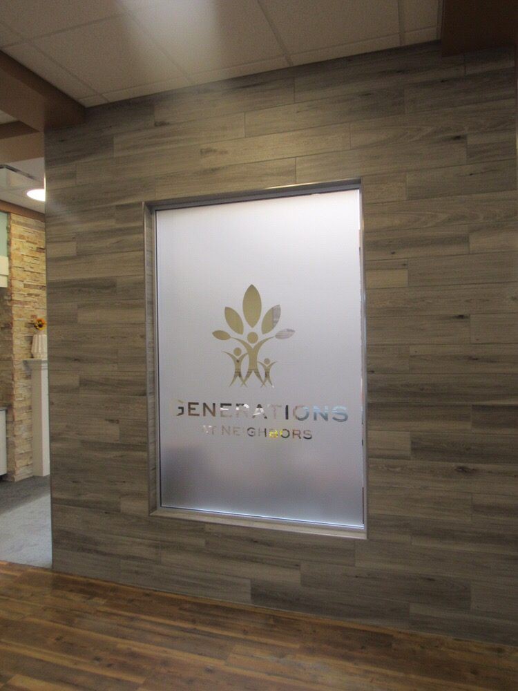 Interior view of a wellness spa with a logo sign on the wall.