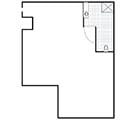 Simple floor plan of a small apartment with bathroom and open living space.