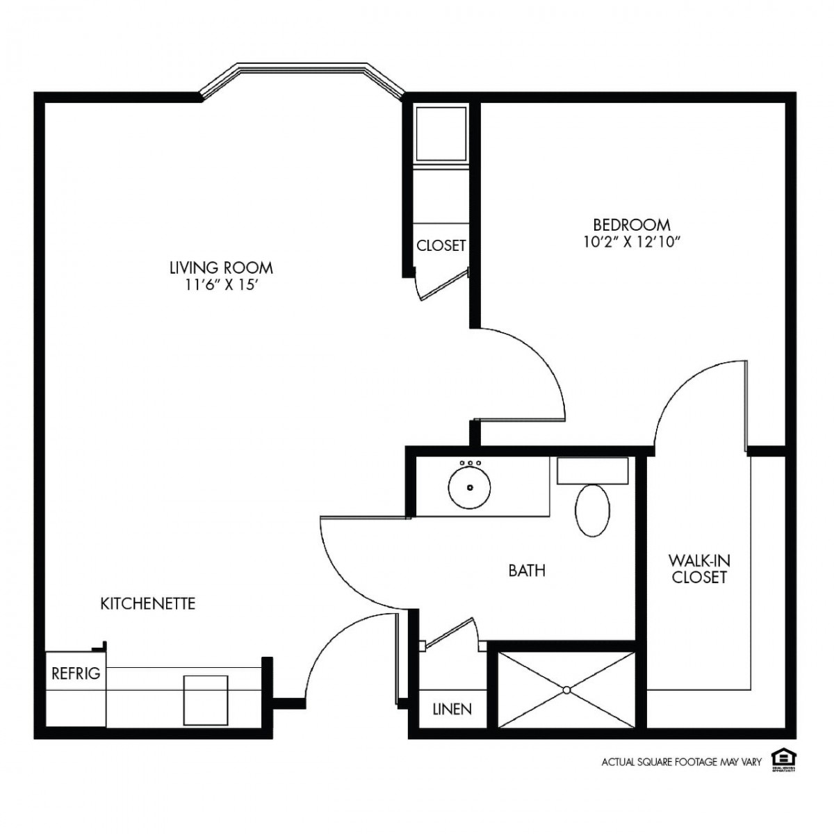 A floor plan of a one-bedroom apartment featuring a living room, kitchen, bathroom, and walk-in closet.