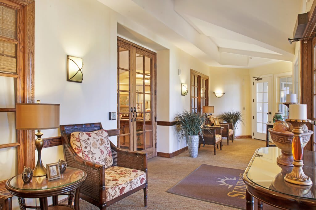 A well-furnished hotel lobby with comfortable seating and elegant decor.