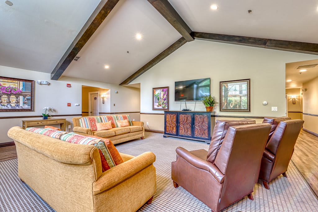 A cozy living room with comfortable seating and stylish decor.