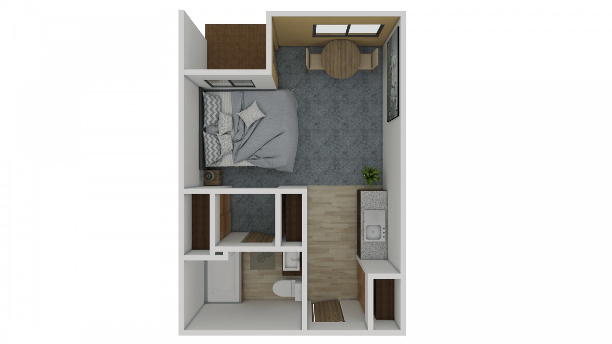 A compact apartment floor plan featuring a bedroom, living area, kitchen, and bathroom.