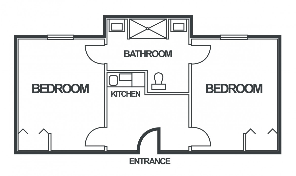 A simple floor plan featuring two bedrooms, a central bathroom, and a kitchen.