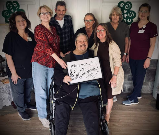 A joyful gathering celebrating a special moment with smiles and camaraderie.