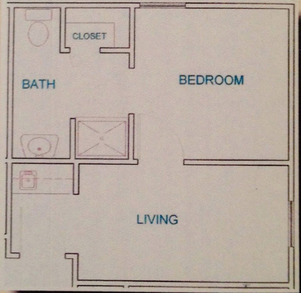A simple floor plan of an apartment featuring a living room, bedroom, bathroom, and closet.