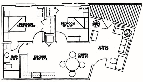 A detailed floor plan illustrating the layout of a home with designated areas for living, dining, kitchen, bedroom, and bathroom.