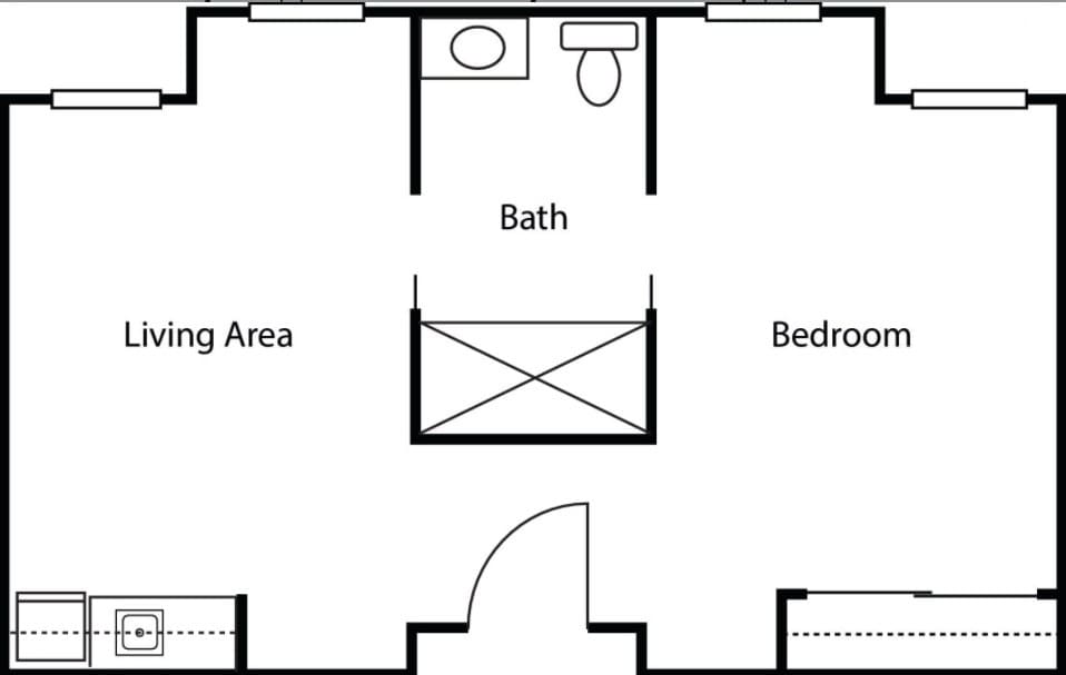 A simple floor plan layout showing a bedroom, bathroom, and living area.