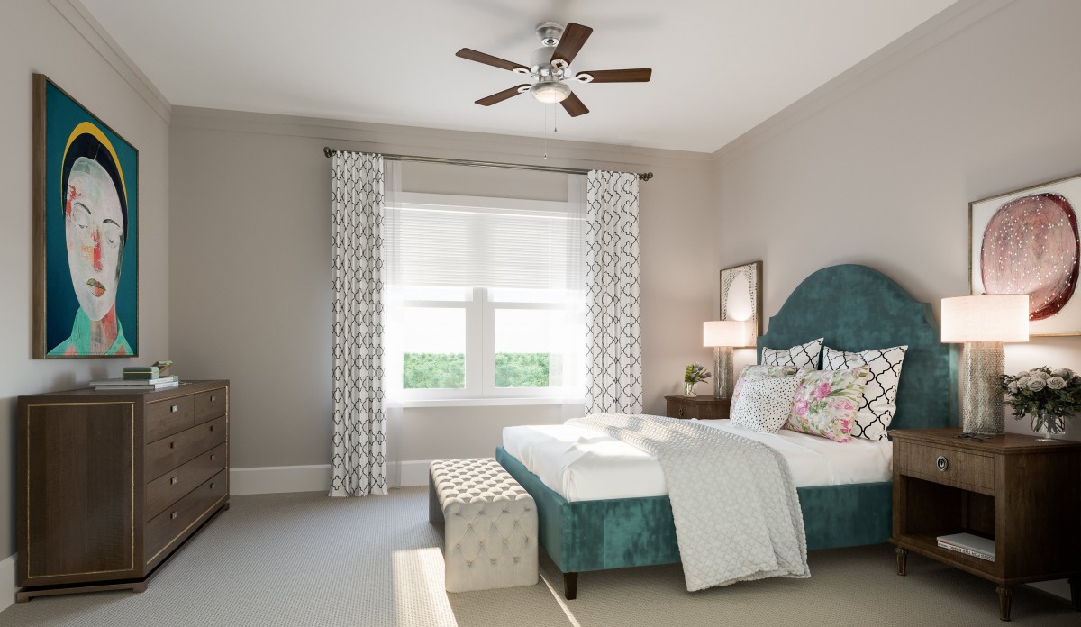 A modern bedroom with a teal bed, patterned curtains, and a ceiling fan.