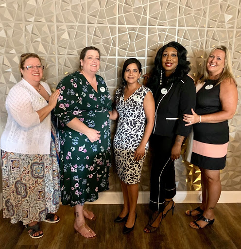 A joyful gathering of friends celebrating their achievements together.