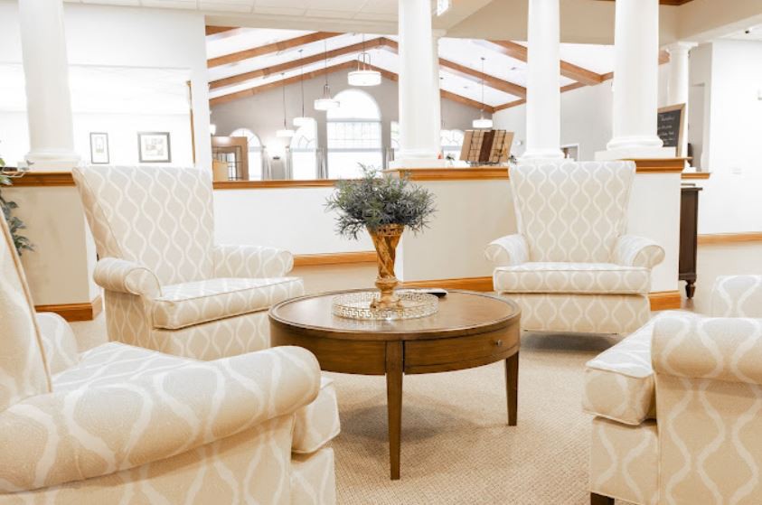 A luxurious and spacious living room with elegant furniture.