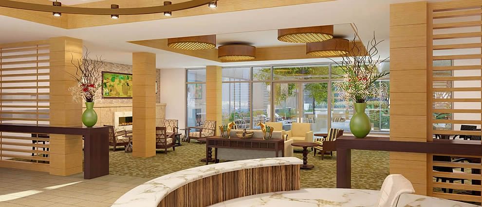 A spacious and elegantly designed hotel lobby featuring modern furniture and large windows.