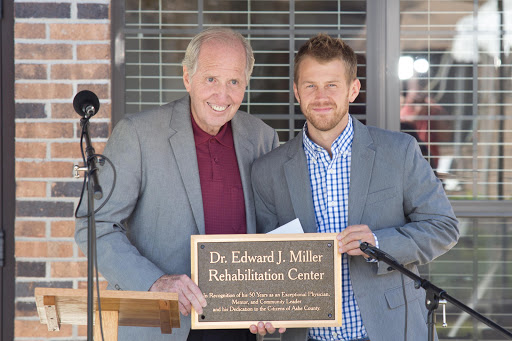 Celebrating the unveiling of the Dr. Edward J. Melker Rehabilitation Center.